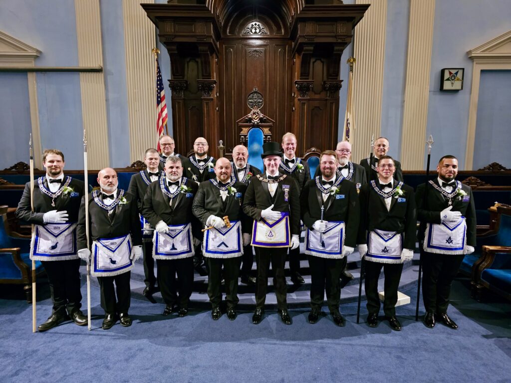 Meet the New Officers of Saggahew Lodge for 2024-2025 - These men are dressed in tuxedos and wearing masonic aprons and wearing various masonic regalia according to the office in which they have been installed